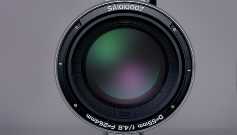 Front-facing view of the Askar SQA55 quintuplet objective lens showing anti-reflective optical coatings and technical specifications printed on the bezel.