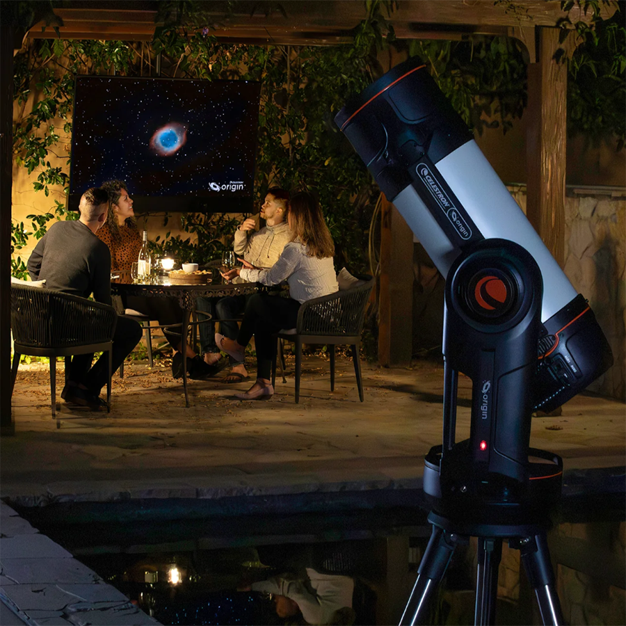 Origin telescope in foreground with a group of observers watching the image of the Ring Nebula develop in real time 