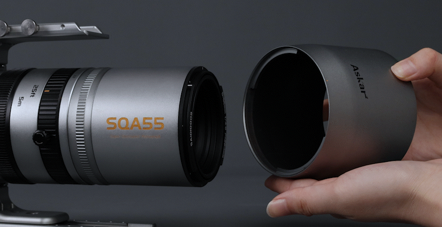 Close-up perspective view of the Askar SQA55 AFKIT electronic focuser motor assembly attached via a synchronous timing belt to the focus ring.