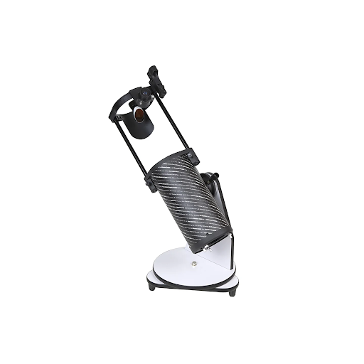 ear-angle view of the fully extended Sky-Watcher Heritage 130P telescope on its white tabletop base, showing the altitude tension adjustment knob and red dot finder alignment.